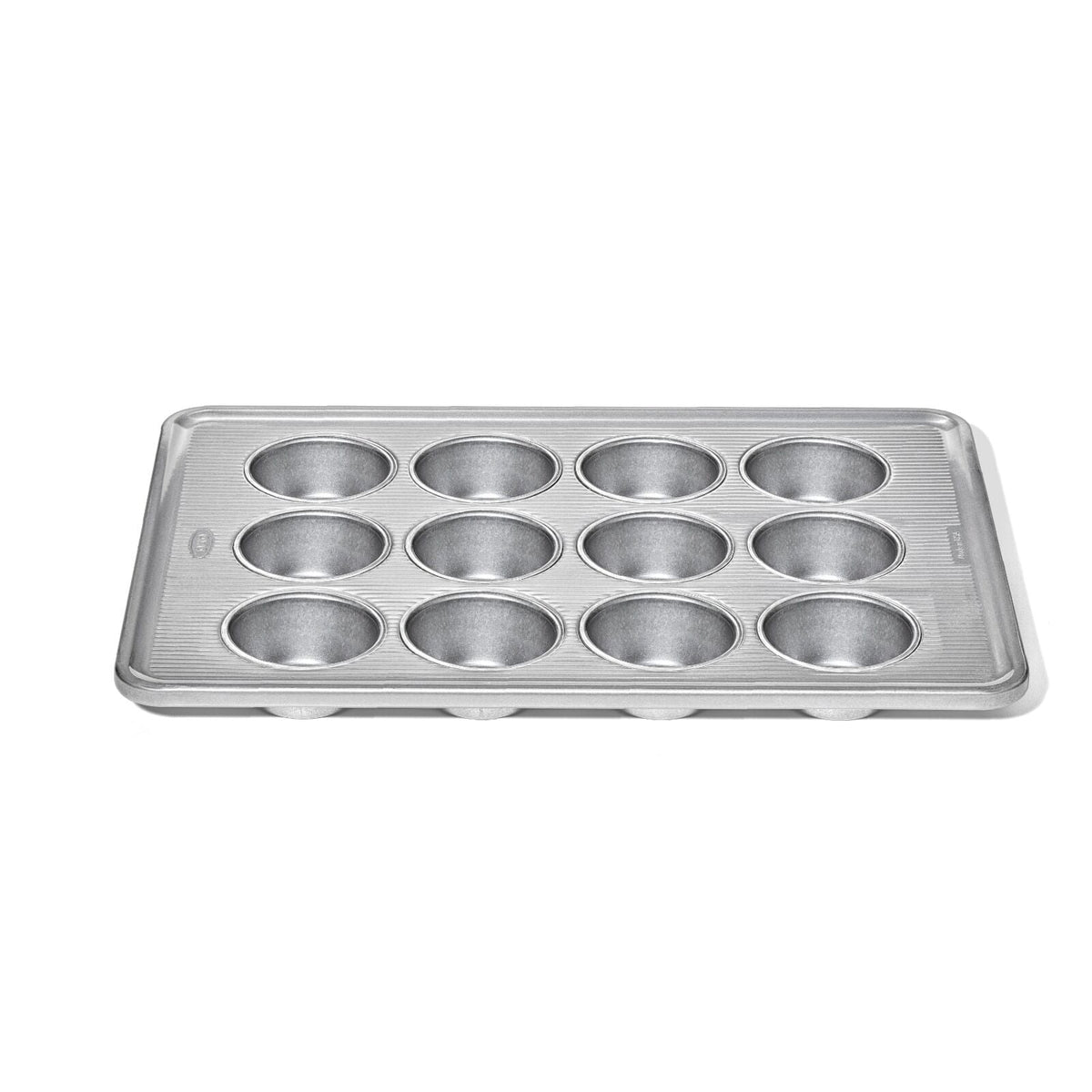 non-stick-pro-clear-coated-12-cup-muffin-pan-y0 gg_11435600_12-cup-muffin-pan_apdp_00_main.jpeg